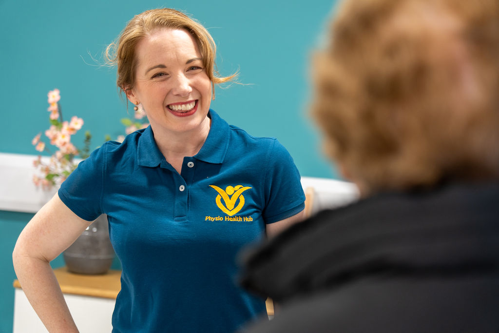 Physiotherapist Vicky Sharpe welcoming a client at Physio Health Hub
